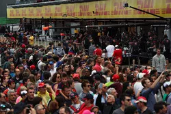 Fans in pit lane