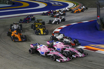 Esteban Ocon, Racing Point Force India VJM11, Sergio Perez, Racing Point Force India VJM11 and Romain Grosjean, Haas F1 Team VF-18
