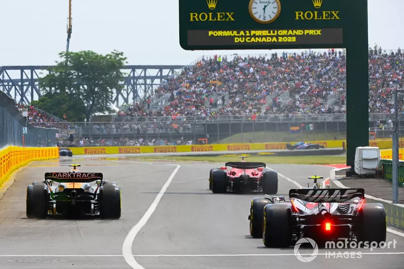 Charles Leclerc, Ferrari SF-23, Lando Norris, McLaren MCL60, Nico Hulkenberg, Haas VF-23