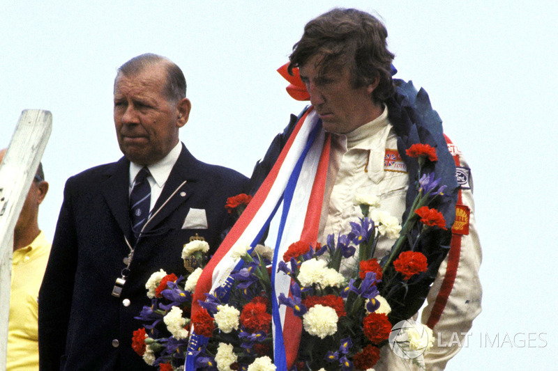 Podio: ganador de la carrera Jochen Rindt, Lotus