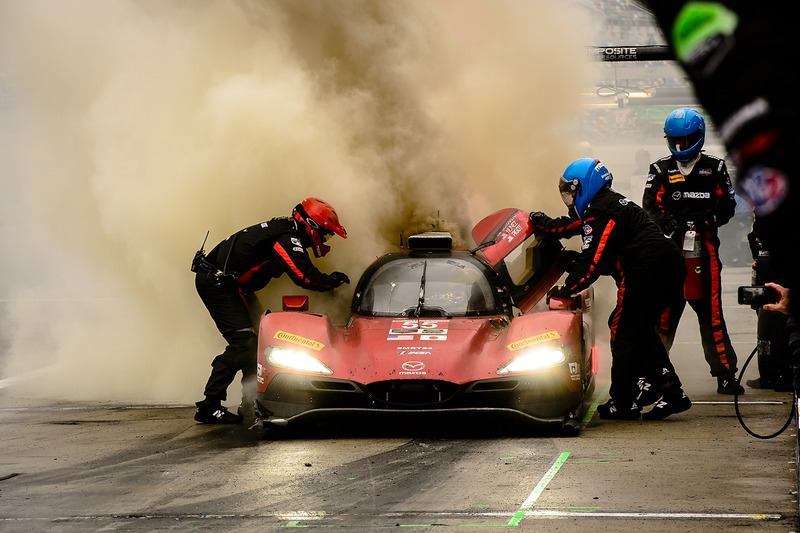 #55 Mazda Motorsports Mazda DPi: Jonathan Bomarito, Tristan Nunez, Spencer Pigot, on fire in the pit