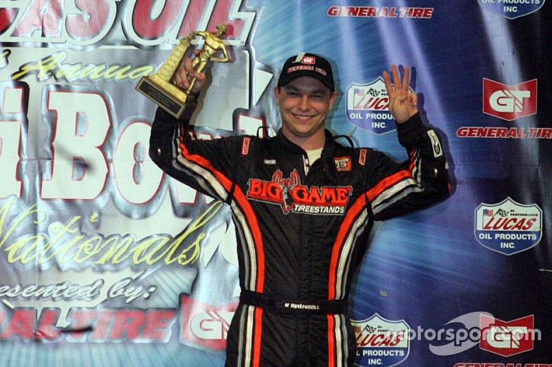 Kevin Swindell celebrates winning the 26th Lucas Oil Chili Bowl