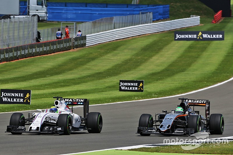 Felipe Massa Williams FW38 and Nico Hulkenberg, Sahara Force India F1 VJM09 battle for position