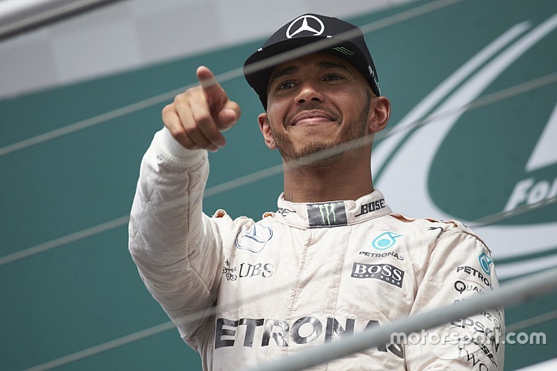 Podium: winner Lewis Hamilton, Mercedes AMG F1