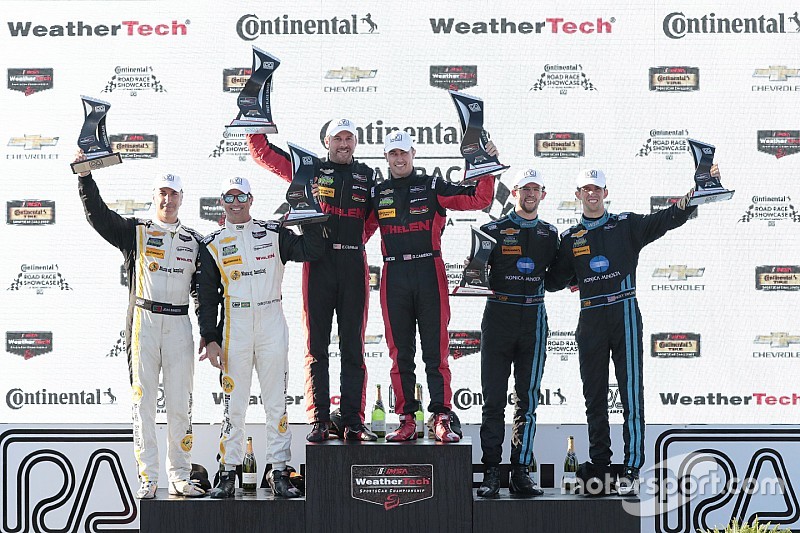 Overall podium: winners Eric Curran, Dane Cameron, Action Express Racing, second place Christian Fittipaldi, Joao Barbosa, Action Express Racing, third place Ricky Taylor, Jordan Taylor, Wayne Taylor Racing