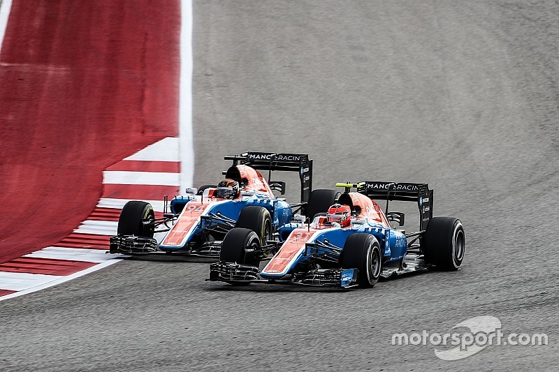 Esteban Ocon, Manor Racing MRT05 and team mate Pascal Wehrlein, Manor Racing MRT05 battle for positi