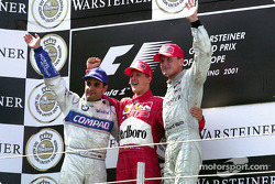 Podium: Juan Pablo Montoya, Michael Schumacher, und David Coulthard