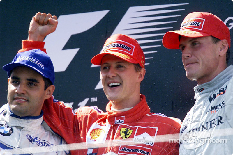 El podio: Juan Pablo Montoya, Michael Schumacher y David Coulthard