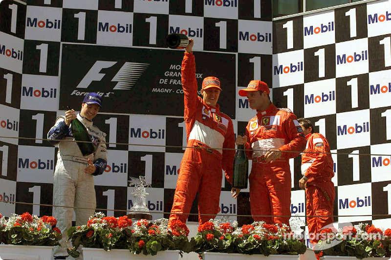 The podium: Ralf Schumacher, Michael Schumacher and Rubens Barrichello