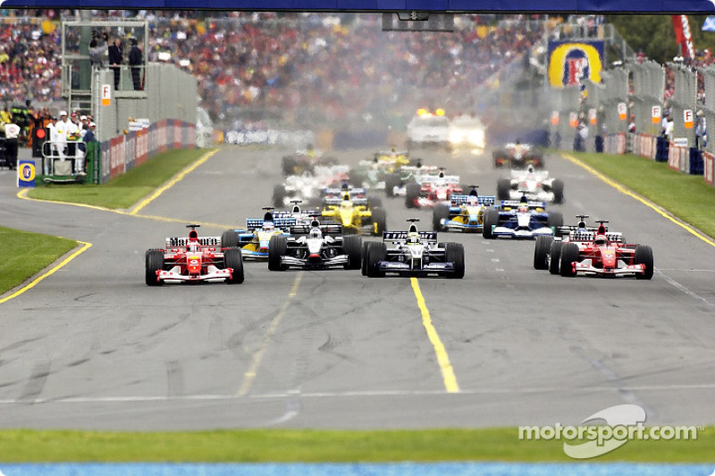 The start: Rubens Barrichello, David Coulthard, Ralf Schumacher and Michael Schumacher leading the c