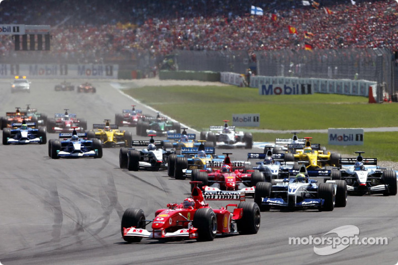 start: Michael Schumacher taking lead front, Ralf Schumacher