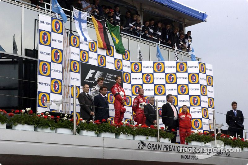 Podio: ganador de la carrera Michael Schumacher, segundo Kimi Raikkonen y tercero Rubens Barrichello