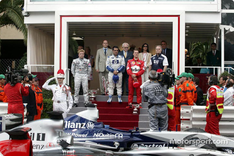 Podio: ganador de la carrera Juan Pablo Montoya, Kimi Raikkonen y Michael Schumacher