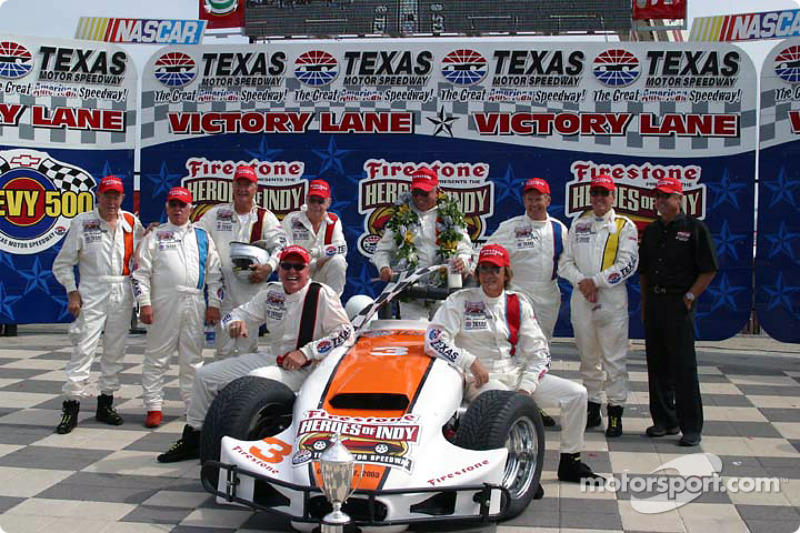 Family picture: Lloyd Ruby, Jim McElreath, Parnelli Jones, Gordon Johncock, Johnny Rutherford, Bill Vukovich, Tom Sneva, Pancho Carter, Arie Luyendyk and Scott Goodyear