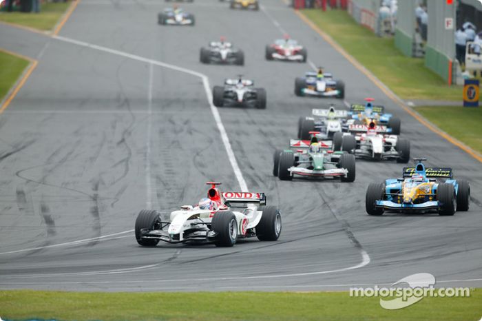 Jenson Button y Fernando Alonso