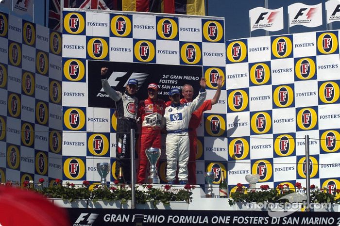 Podio: el ganador de la carrera Michael Schumacher con Jenson Button y Juan Pablo Montoya