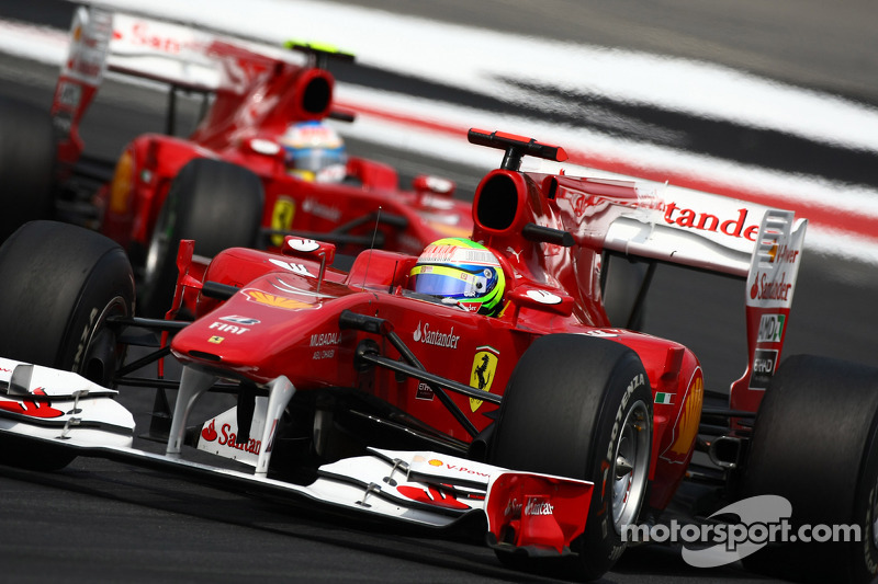 Felipe Massa, Scuderia Ferrari leads Fernando Alonso, Scuderia Ferrari