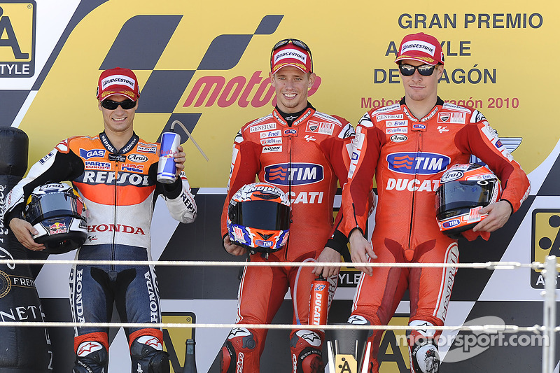 Podium: winnaar Casey Stoner, Ducati Marlboro Team, 2de Dani Pedrosa, Repsol Honda Team, 3de Nicky H