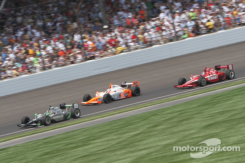 2011: Wheldon met Townsend Bell en Dario Franchitti