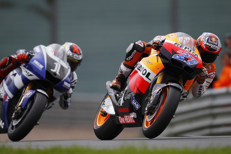 Casey Stoner, Repsol Honda Team;  Jorge Lorenzo, Yamaha Factory Racing