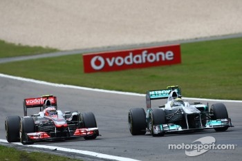 Jenson Button, McLaren Mercedes and Nico Rosberg, Mercedes GP F1 Team