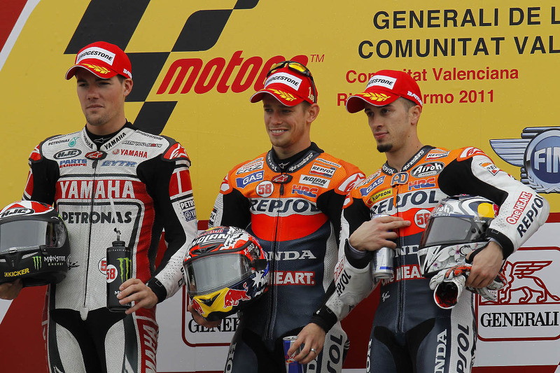 Podium: race winner Casey Stoner, second place Ben Spies, third place Andrea Dovizioso