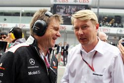 Dr. Aki Hintsa, McLaren Team Doctor with Mika Hakkinen