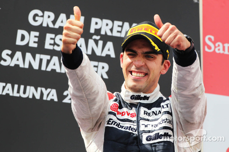 Race winner Pastor Maldonado, Williams F1 Team celebrates on the podium