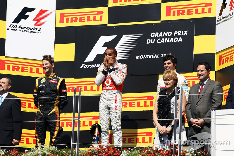 Podium, Romain Grosjean, Lotus F1 Team, segundo; Lewis Hamilton, McLaren Mercedes, ganador de la car