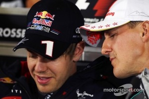 Sebastian Vettel, Red Bull Racing and Michael Schumacher, Mercedes AMG F1