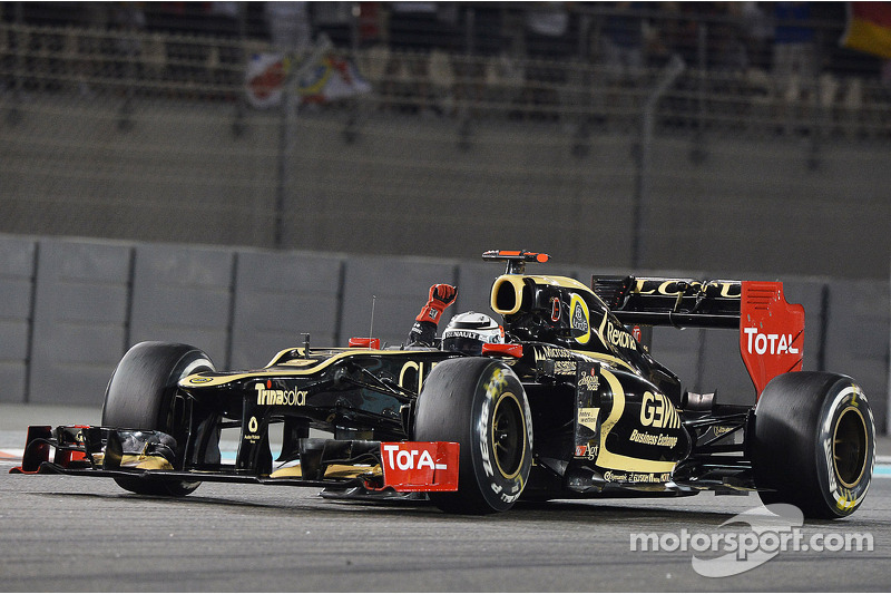 Race winner Kimi Raikkonen, Lotus F1 celebrates at the end of the race