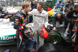 Sebastian Vettel, Red Bull Racing and Michael Schumacher, Mercedes GP