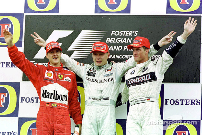 Podium: race winner Mika Hakkinen, second place Michael Schumacher, third place Ralf Schumacher