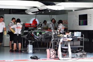 McLaren MP4-28 is prepared in the pits