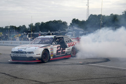 Race winner A.J. Allmendinger celebrates