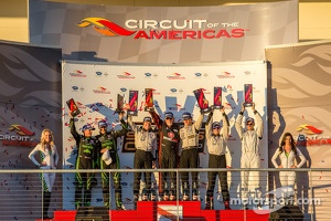 P2 podium: class winners Scott Tucker and Ryan Briscoe, second place Marino Franchitti and Guy Cosmo, third place Ed Brown and Johannes van Overbeek