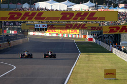 Sebastian Vettel, Red Bull Racing et Romain Grosjean, Lotus F1 Team