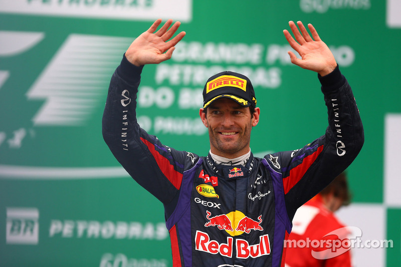 Mark Webber, Red Bull Racing celebrates his second position and last GP on the podium