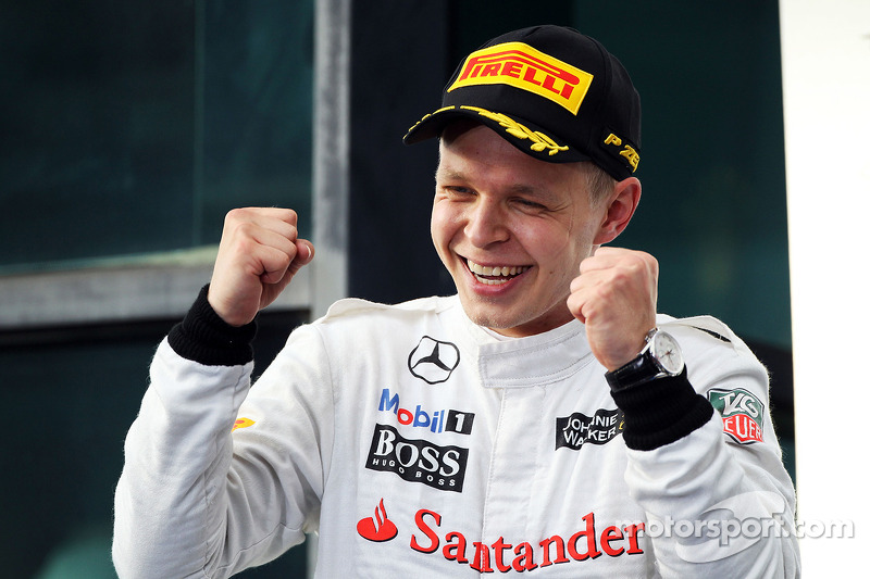 Kevin Magnussen, McLaren celebrates his third position on the podium