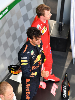 Daniel Ricciardo, Red Bull Racing and Kimi Raikkonen, Ferrari on the podium