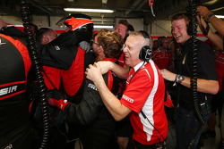 The Marussia F1 Team celebrate Jules Bianchi, scoring their first F1 points