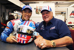 Takuma Sato and A.J. Foyt with charity helmet