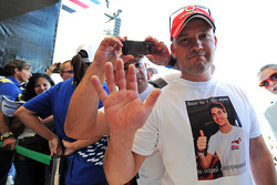 A fan wearing a Jules Bianchi, Marussia F1 Team T-Shirt at the Fanzone