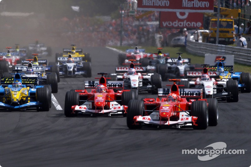 Start: Michael Schumacher takes lead ve Rubens Barrichello ve Fernando Alonso