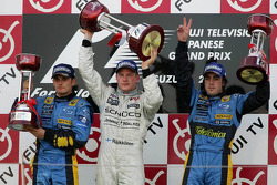 Podium: race winner Kimi Raikkonen with Giancarlo Fisichella and Fernando Alonso