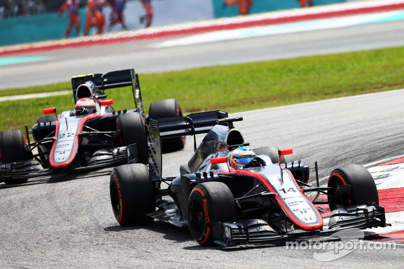 Fernando Alonso, McLaren MP4-30 leads team mate Jenson Button, McLaren MP4-31