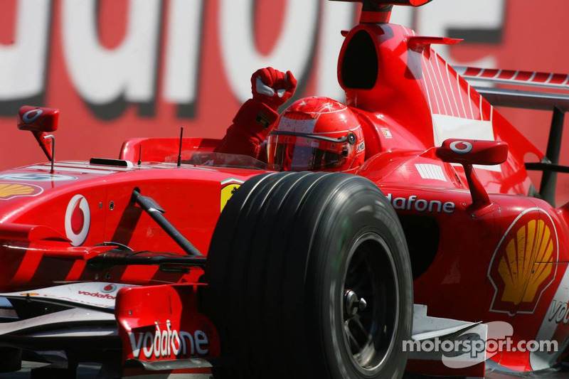 Race winner Michael Schumacher celebrates