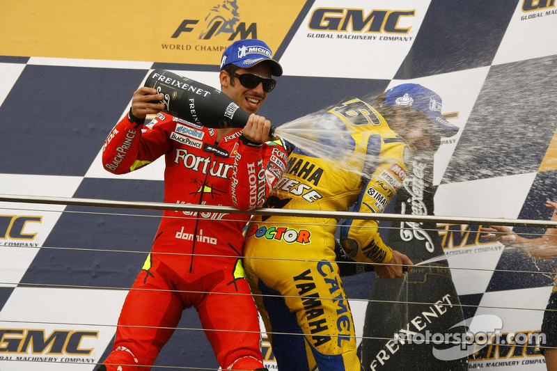 Podium: champagne for Marco Melandri and Valentino Rossi