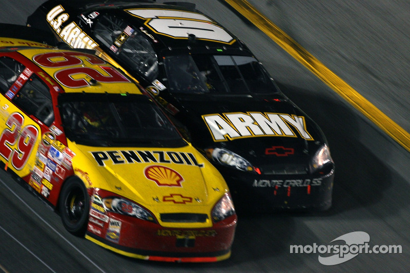 As the crash takes place, Kevin Harvick passes Mark Martin for the victory, a few hundred feet befor