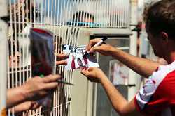 Sebastian Vettel, Ferrari signs autographs for the fans